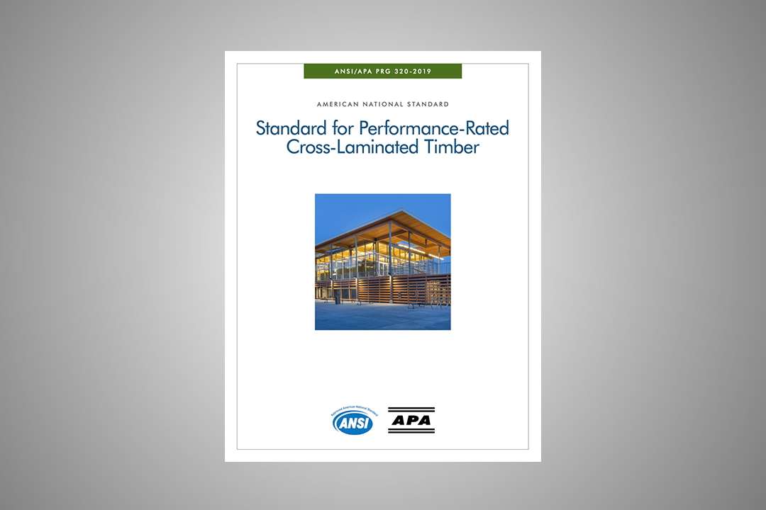 The cover of a document titled "Standard for Performance-Rated Cross-Laminated Timber," issued by the American National Standards Institute (ANSI) and the APA. The cover features an image of a modern building made with cross-laminated timber, set against a blue sky, and includes logos for ANSI and APA at the bottom. The standard referenced is ANSI/APA PRG 320-2019.