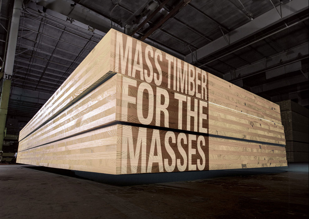 The image features large stacked panels of mass timber with the words "MASS TIMBER FOR THE MASSES" prominently displayed on the side.